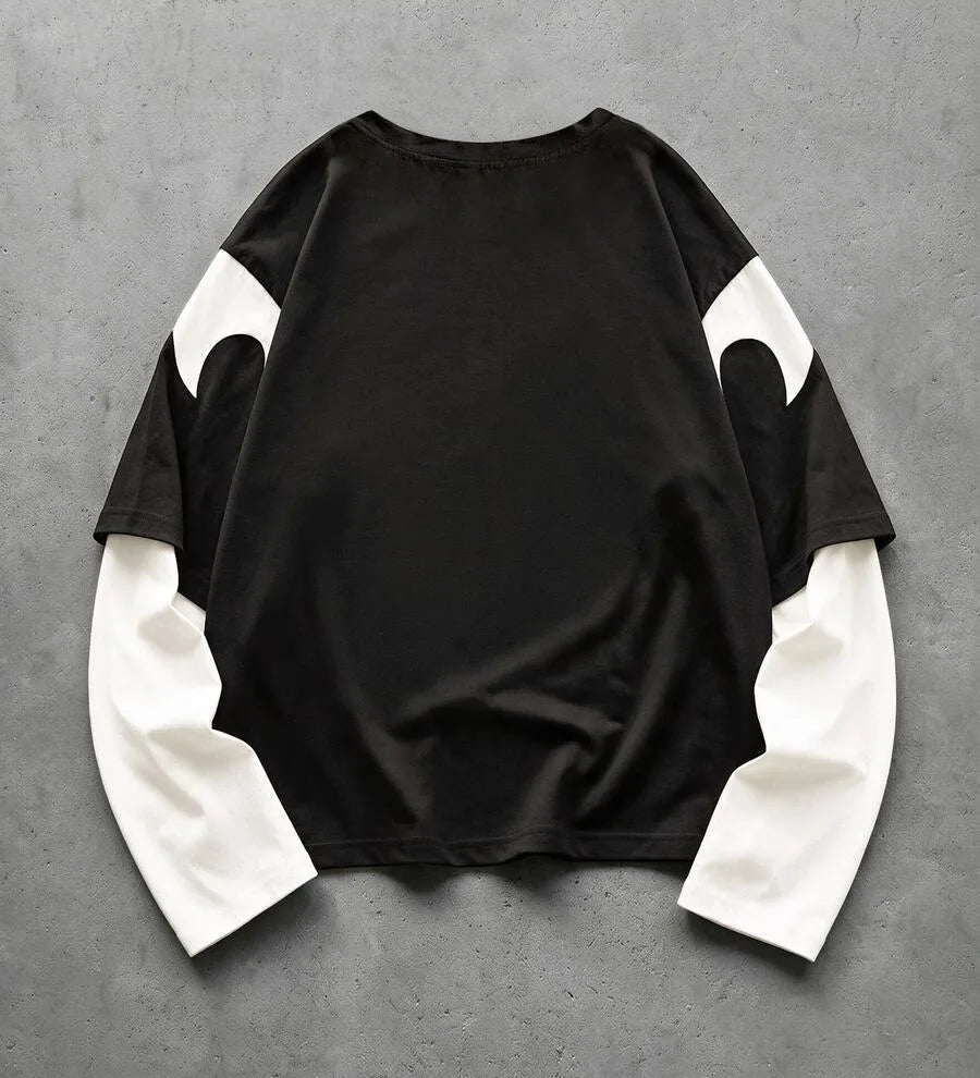 T-shirt med rund hals og lange ternede patchworkærmer
