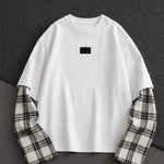 T-shirt med rund hals og lange ternede patchworkærmer