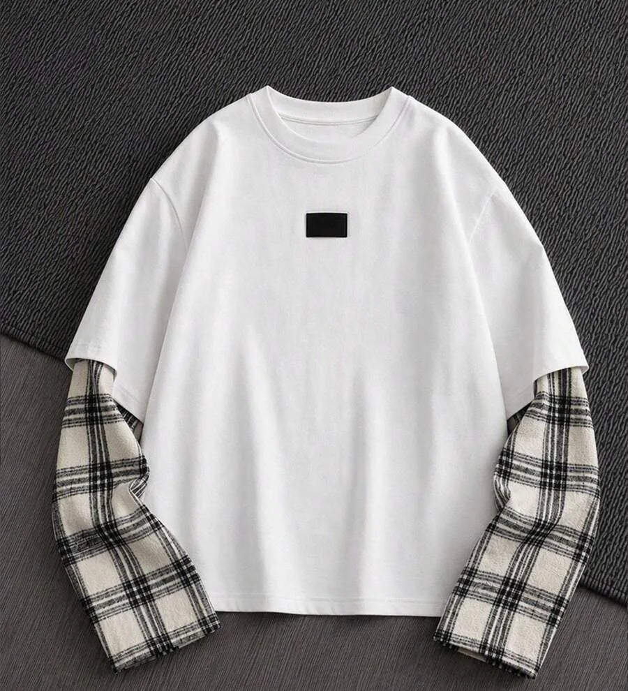 T-shirt med rund hals og lange ternede patchworkærmer