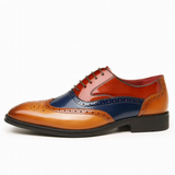 Herre broguesko med wingtip, perforerede detaljer, snørebånd og lav hæl