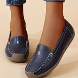 Mocassins femme à surpiqûres contrastées et semelle plate