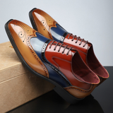 Herre broguesko med wingtip, perforerede detaljer, snørebånd og lav hæl