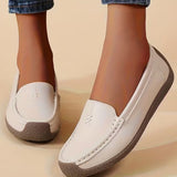 Mocassins femme à surpiqûres contrastées et semelle plate