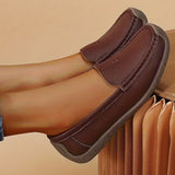 Mocassins femme à surpiqûres contrastées et semelle plate