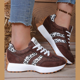 Damesneakers med retrostriber, snørebånd og lav sål
