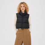 Gilet court femme matelassé à col haut et zip
