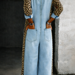 Damejumpsuit med skjortekrave, knaplukning, store lommer, brede ben og dyreprintede sidepaneler