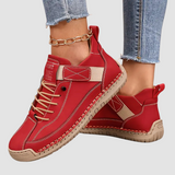 Sneakers med snørebånd, rem og rund tå