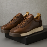 Unisex sneakers med snørebånd, rund tå og strukturerede sidepaneler