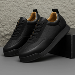 Unisex sneakers med snørebånd, rund tå og strukturerede sidepaneler