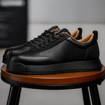Unisex sneakers med snørebånd, rund tå og strukturerede sidepaneler