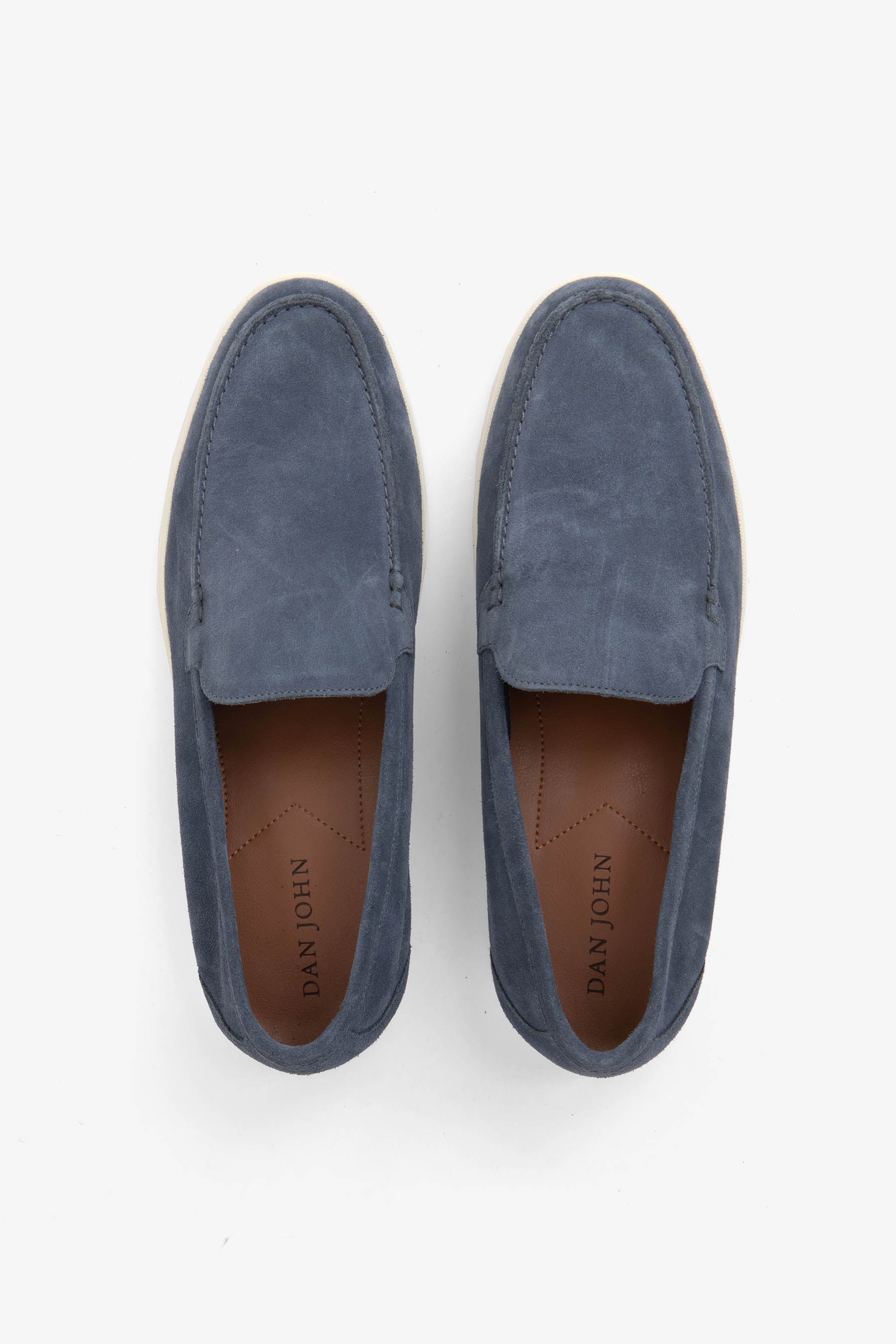 Blå loafers med rund tå, flad lys sål og slip-on-design