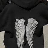 Hættetrøje med hætte og stort vingemotiv med pailletdetaljer på ryggen