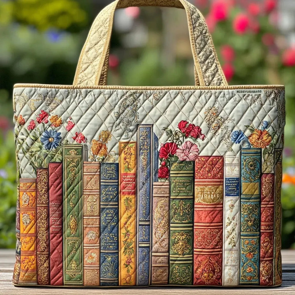 Quiltet mulepose med blomstermotiv og lange hanke