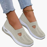 Damesneakers med strikket overdel, udskæring og hvid sål