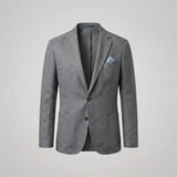 Herreblazer med reverskrave, knapper, brystlomme og forlommer