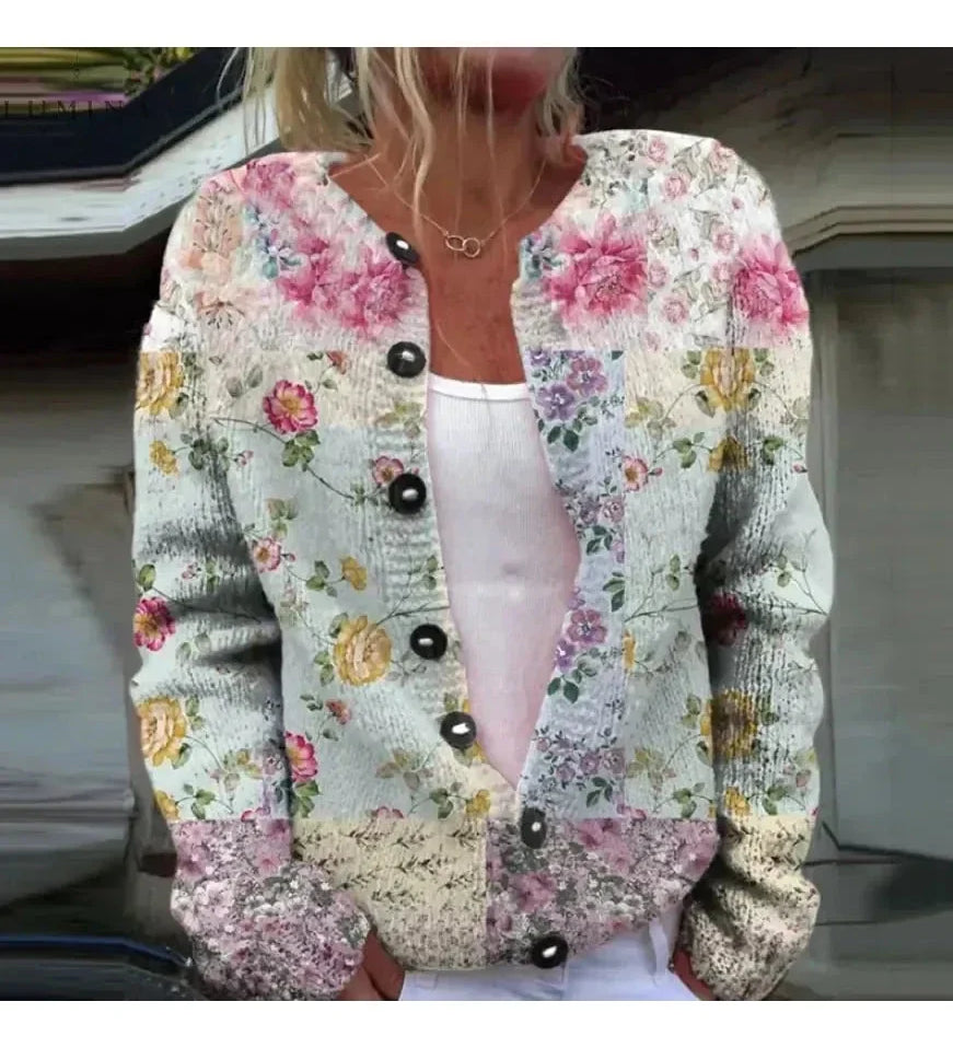 Damecardigan med blomstret mønster, rund hals, lange ærmer og knapper foran
