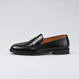 Sorte herre loafers med lav hæl og klassisk remdetalje