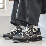 Herre sneakers med snørebånd, paneldesign og kraftig sål