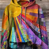Damehættetrøje med farverigt patchwork, hætte og lange ærmer